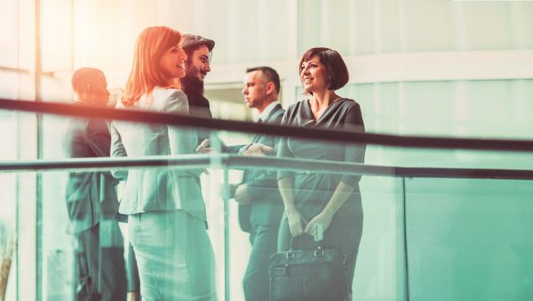 Group of business people in the office building lobby