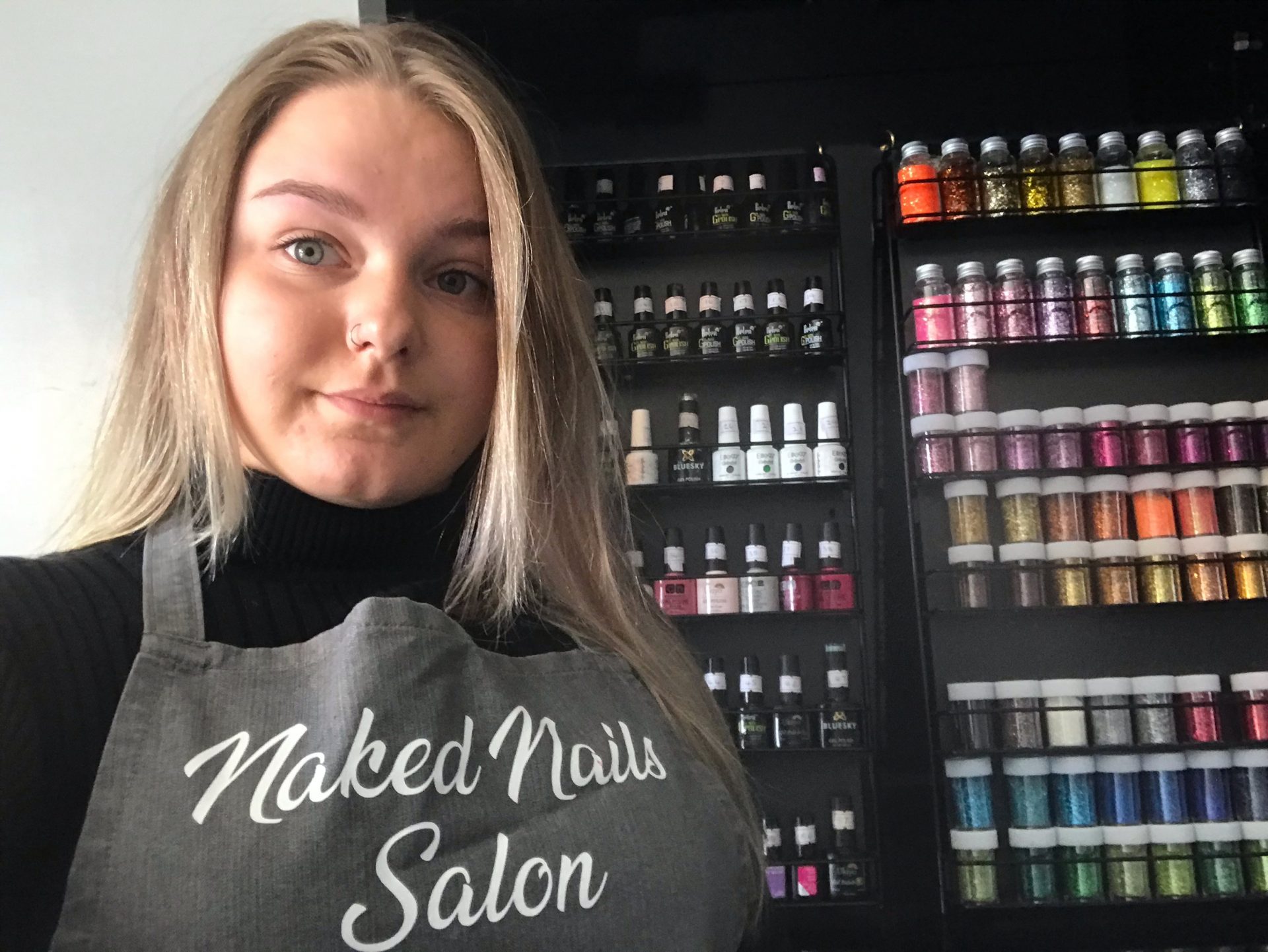 Nail student with her nail products