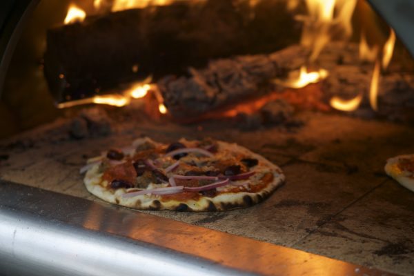 pizza in pizza oven, burning wood, fire & flames - pic 1