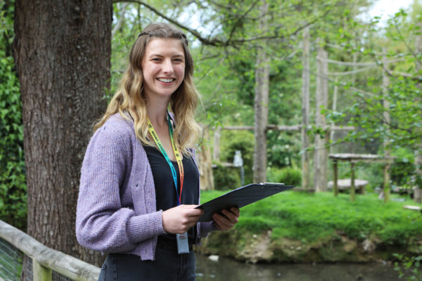 A zoology student holding a clipboard in Newquay Zoo
