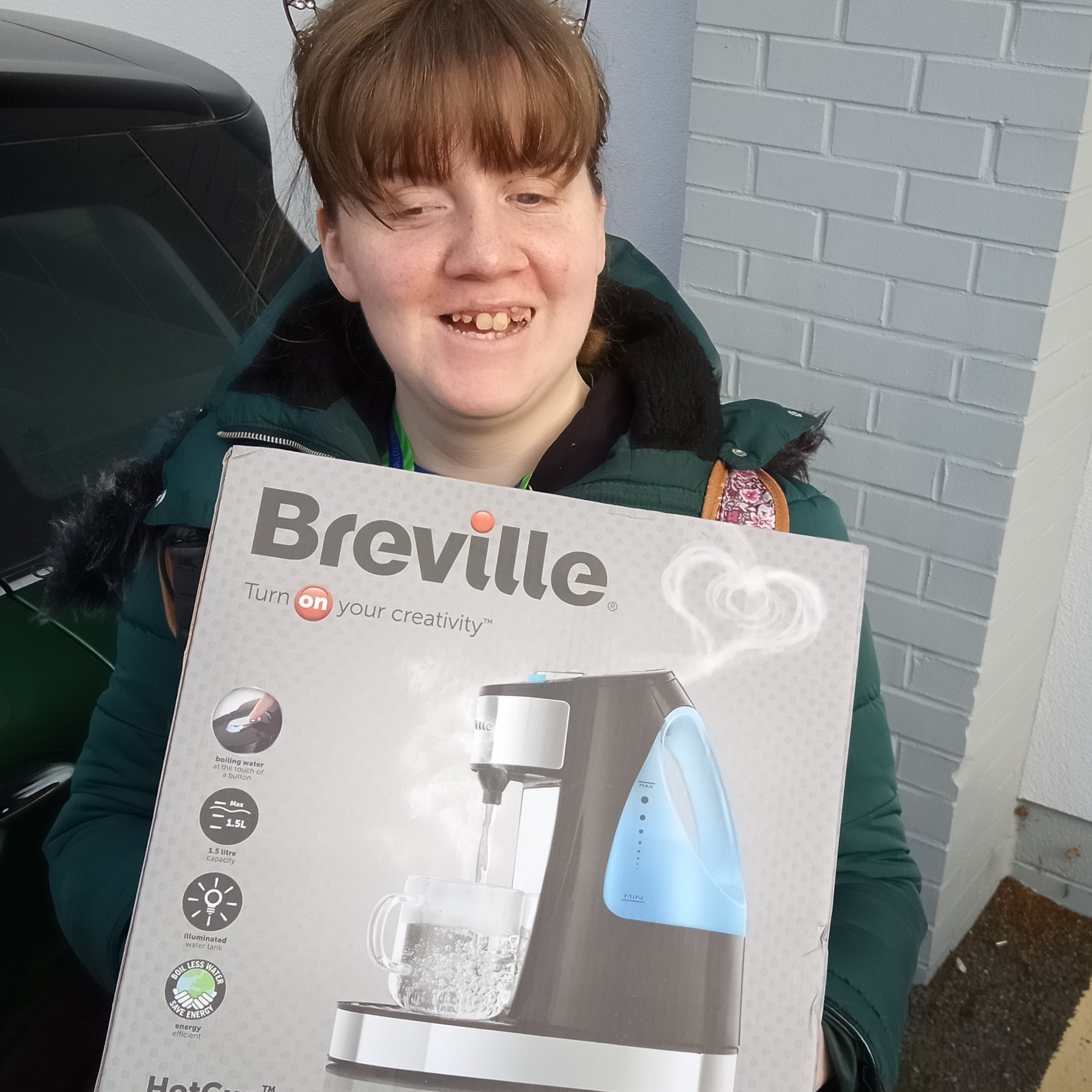 A blind student with an adapted kettle