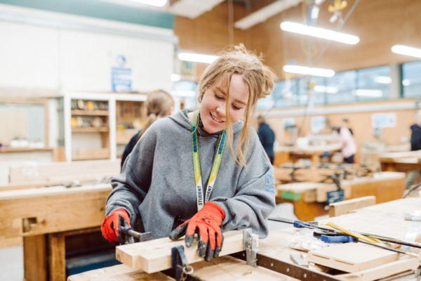 A student studying carpentry