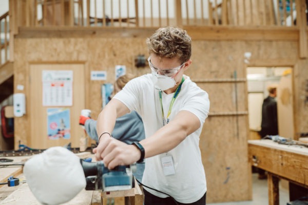 A student studying carpentry