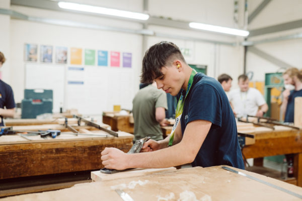 A student studying carpentry